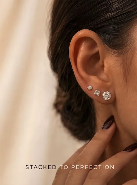 Diamond studs stacked on ear