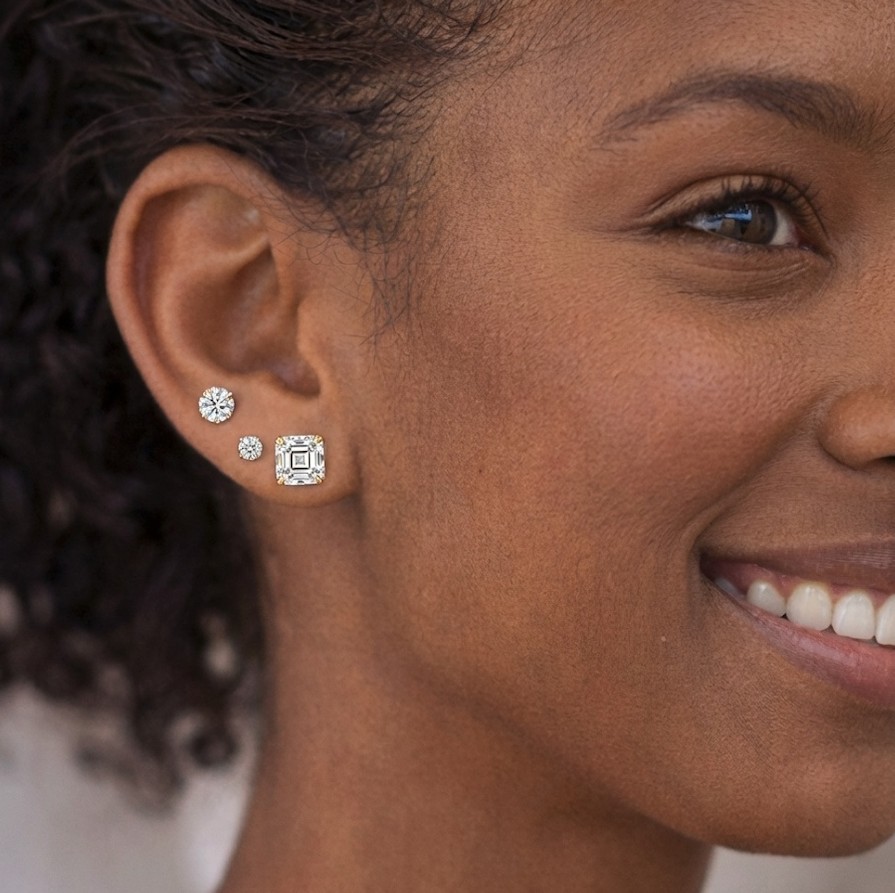 Asscher cut diamond studs on ear